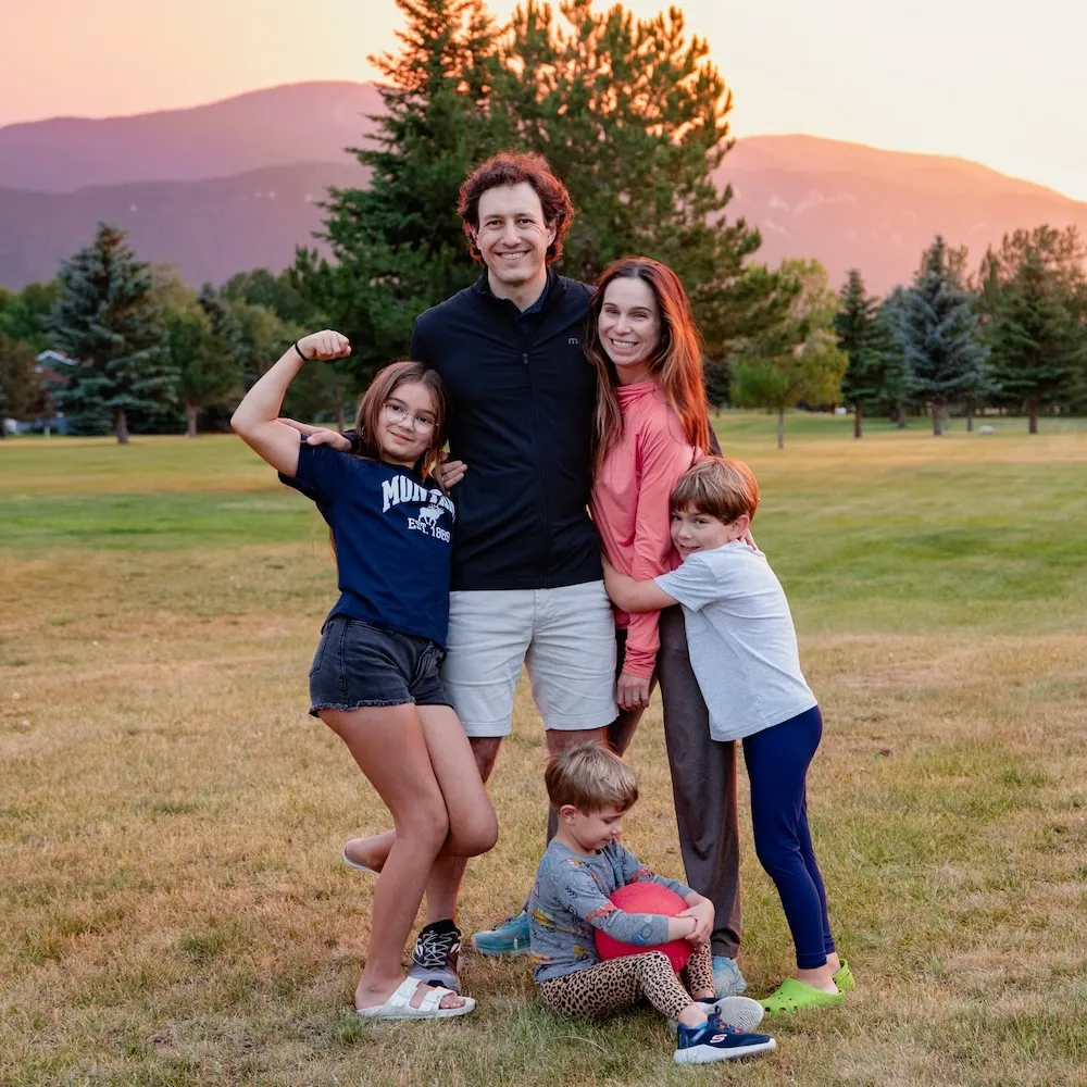 Tony Calvis, Jr. with his wife and three children